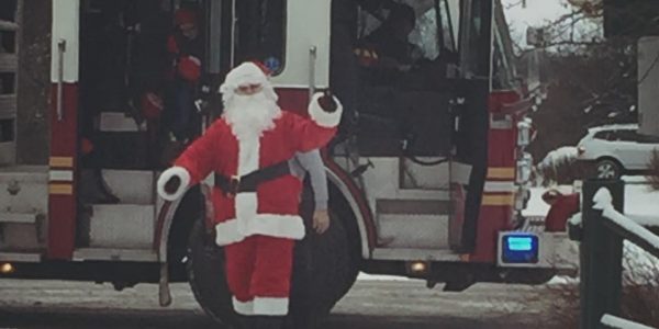 Santa Arrives to Timberlake on a Fire Truck